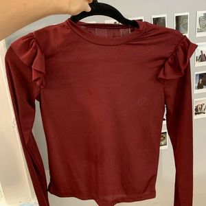 Red ribbed long sleeve shirt with ruffled sleeves